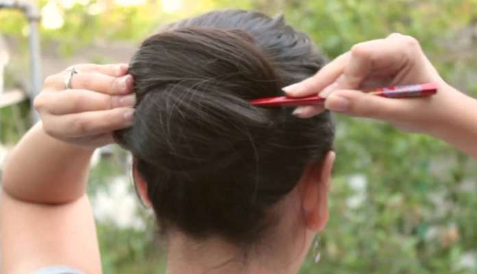 how to tie hair with stick